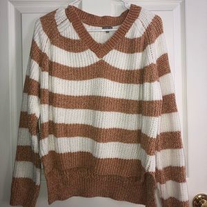 A tan sweater
